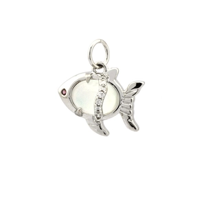 Macro view of fish-shaped silver pendant with iridescent opal and sparkling cubic zirconia