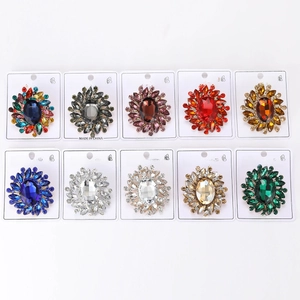 Set of 10 colorful sunburst crystal brooches with marquise cut stones and gold finish
