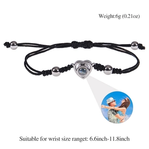 Custom heart photo projection bracelet with black braided cord and adjustable pull string