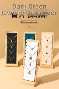 Bamboo necklace display stand showing serrated slots and colorful velvet back panels