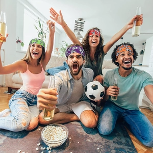 Athletic soccer headbands in vibrant colors worn by friends in a dynamic lifestyle setting