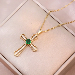 Vintage golden cross necklace with emerald gemstone and white zircon pavé setting