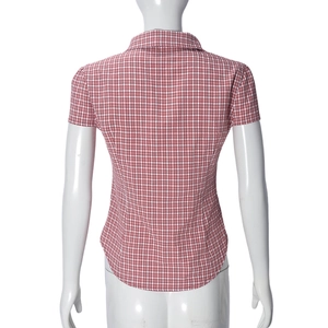 Detailed back view of a slim fit red and white plaid short sleeve shirt on a mannequin