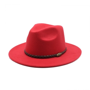 Bright red wool jazz fedora hat with brown braided leather band and metal buckle