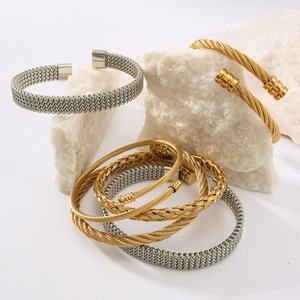 Detailed macro view of cable wire texture and woven patterns on titanium steel bangles