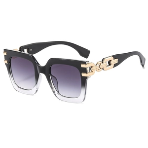 Modern square sunglasses with black gradient frames and golden chain metal temples