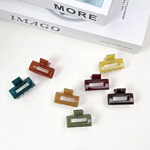 Close-up of 7-piece rectangular jelly texture hair claws in various retro matte colors