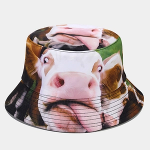 Close-up of the detailed cow face photo print and fine stitching on the twill bucket hat