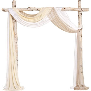 Trio of white, cream, and champagne chiffon drapes on a rustic birch wedding arch