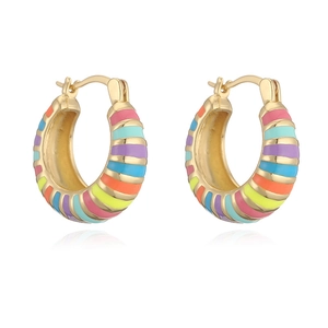 Macro detail of gold-plated hoop earrings with colorful enamel rainbow stripes and secure clasp