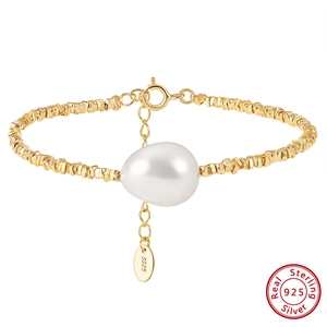 925 sterling silver gold beaded bracelet featuring a white baroque pearl pendant