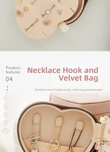 Close-up of pink PU leather jewelry box featuring necklace hooks and velvet storage pouch