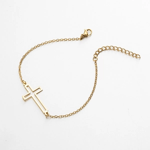 Detail of adjustable gold hollow cross bracelet with lobster clasp and extender chain