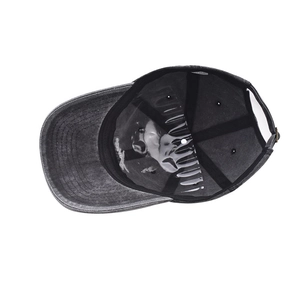 Detail of washed cotton baseball cap featuring art lining and adjustable back strap