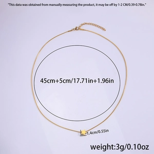 Macro shot of gold star pendant necklace showing 45cm chain length and 1.4cm diameter