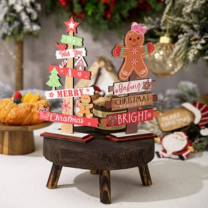 Wooden Christmas gingerbread man and tree desk ornament with festive holiday greetings