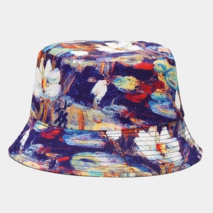 Omkeerbare vissershoed met artistiek olieverf bloemenpatroon in blauw en geel
