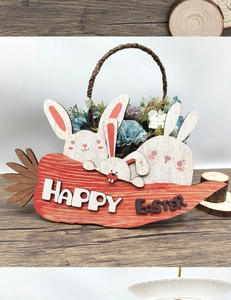 Detail of wooden Easter carrot sign featuring three rabbits and Happy Easter carving