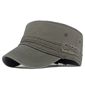 Detail view of the olive green cotton cadet cap featuring distressed frayed edges