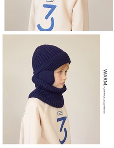 Detail of rib-knit winter balaclava for kids with fleece lining and integrated neck warmer
