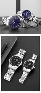 Macro view of blue and black couple quartz watches with classic roman numeral dials
