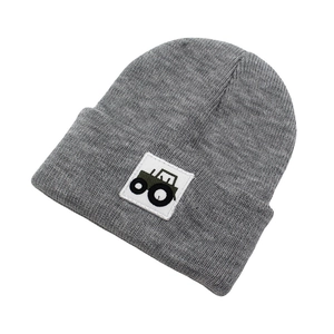 Close-up of tractor embroidery on grey ribbed knit baby hat with thick folded cuff