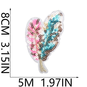 Detail view of pink and gold sequin feather patch with 8cm x 5cm size measurements