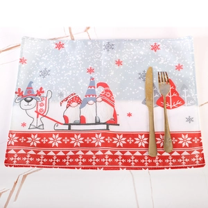 Christmas table mat featuring cute gnomes and reindeer patterns on marble background
