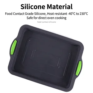 Dark grey silicone brownie pan with green handles, heat resistant from -40 to 230°C