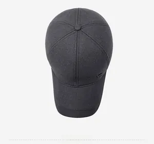 Top view of dark grey winter baseball cap showing premium cotton twill texture and logo