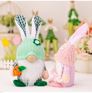 Close-up of Easter gnomes with knit hats, white beard, and carrot in soft spring colors