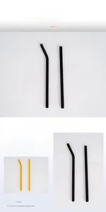 Detail of clear heat-resistant borosilicate glass straws in black and amber colors