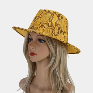 Detailed side view of a yellow snakeskin pattern fedora hat on a display mannequin head