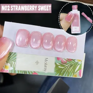 Detail view of N02 pink cat-eye gel nail polish with shimmering pearlescent effect