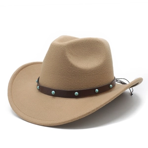 Detail of khaki cowboy hat featuring brown leather band and turquoise studs decoration