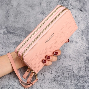 Pink embossed leather long wallet with double zippers and wrist strap for women