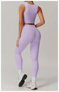 Detail of lilac breathable yoga crop top and high-waisted leggings with sculpting back seam