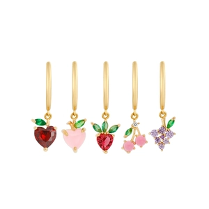 Detail view of 5-piece gold fruit hoop earring set with colorful cubic zirconia