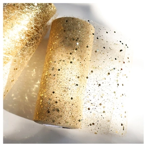 Detail of champagne gold mesh ribbon with sparkling hexagonal sequins for Christmas decor