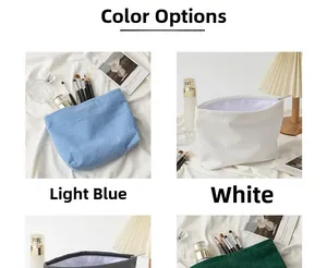 Macro shot of assorted corduroy cosmetic bags in blue, white, gray and green colors
