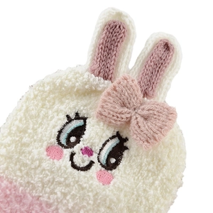 Pink and white knit baby socks with cute 3D bunny ears and soft coral fleece texture