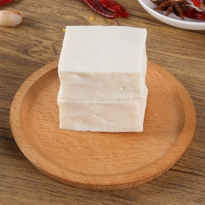 Realistic PVC tofu blocks display on wooden tray with spices for kitchen decor photography