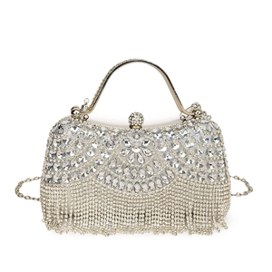 Elegant silver evening clutch bag with sparkling rhinestones and delicate tassel details