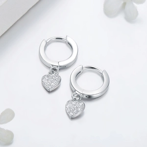 Elegant S925 sterling silver hoop earrings with sparkling crystal heart-shaped pendants