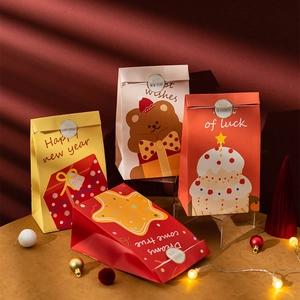 Festive Christmas paper gift bags with warm holiday patterns and greeting prints