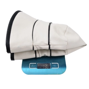 Minimalist white PU leather wide brim sun hat weighing approximately 130g on scale