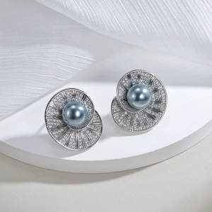Elegant S925 silver stud earrings with grey pearl and zircon petals on white silk stand