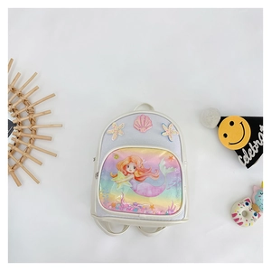 Close-up of glitter mermaid backpack for girls with 3D shell and starfish details