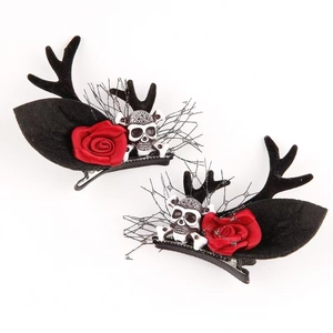 Gothic Halloween hair clips with black antlers, white skull, red rose and mesh on white background