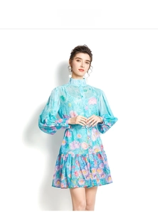 Detail of floral chiffon mini dress with lantern sleeves, stand collar and buttons